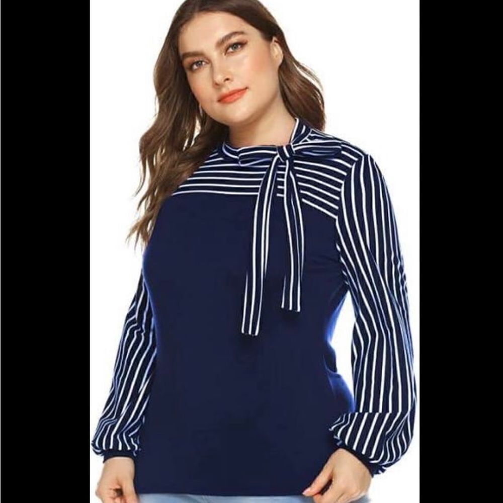 In Voland Navy blue and white striped long sleeve top with tie neck. NWT
